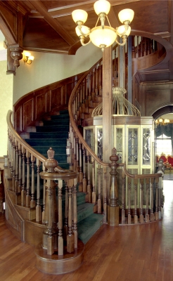 A luxurious traditional wood balustrade with rich detail.